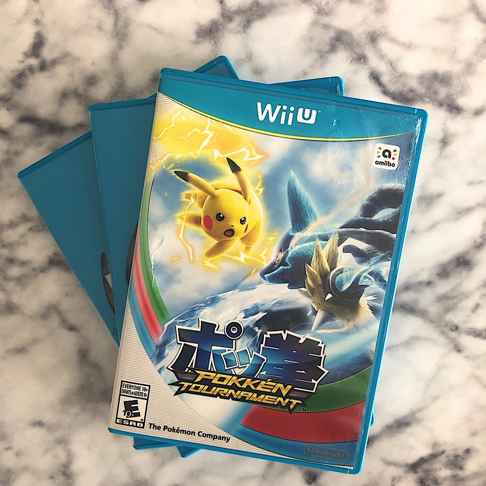 Wii U games bundle:Pokken Tournament, Super Mario 3D world and Super Smash Bros.